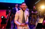 27 September 2019; UFC fighter Conor McGregor celebrates after team-mate Peter Queally was declared victorious over Ryan Scope in their welterweight bout at Bellator Dublin in the 3Arena, Dublin. Photo by David Fitzgerald/Sportsfile