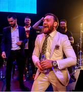 27 September 2019; UFC fighter Conor McGregor celebrates after team-mate Peter Queally was declared victorious over Ryan Scope in their welterweight bout at Bellator Dublin in the 3Arena, Dublin. Photo by David Fitzgerald/Sportsfile