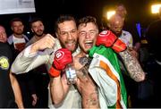 27 September 2019; James Gallagher celebrates with team-mate Conor McGregor after defeating Roman Salazar in their contract weight bout at Bellator Dublin in the 3Arena, Dublin. Photo by David Fitzgerald/Sportsfile