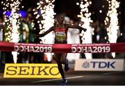 27 September 2019; Ruth Chepngetich of Kenya celebrates winning the Women's Marathon during day one of the World Athletics Championships 2019 at the Corniche in Doha, Qatar. Photo by Sam Barnes/Sportsfile