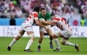 28 September 2019; Jack Carty of Ireland is tackled by James Moore, left, and Luke Thompson of Japan during the 2019 Rugby World Cup Pool A match between Japan and Ireland at the Shizuoka Stadium Ecopa in Fukuroi, Shizuoka Prefecture, Japan. Photo by Brendan Moran/Sportsfile