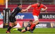 28 September 2019; Darren O'Shea of Munster is tackled by Tavis Knoyle, right, and Sam Davies of Dragons during the Guinness PRO14 Round 1 match between Munster and Dragons at Thomond Park in Limerick. Photo by Harry Murphy/Sportsfile