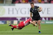 28 September 2019; Matt Healy of Connacht is tackled by Ryan Conbeer of Scarlets during the Guinness PRO14 Round 1 match between Scarlets and Connacht at Parc y Scarlets in Llanelli, Wales. Photo by Chris Fairweather/Sportsfile