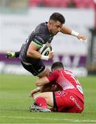28 September 2019; Tiernan O'Halloran of Connacht is tackled by Ryan Conbeer of Scarlets during the Guinness PRO14 Round 1 match between Scarlets and Connacht at Parc y Scarlets in Llanelli, Wales. Photo by Chris Fairweather/Sportsfile