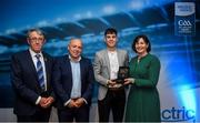 28 September 2019; Pictured is the Electric Ireland Minor Hurling All Star winner Eoin Lawless of Galway at the 2019 Electric Ireland Minor Star Awards alongside, from left, Munster Council chairman Liam Lenihan, Derek McGrath and Executive Director of ESB Marguerite Sayers. The Hurling Team of the Year was selected by an expert panel of GAA legends including Alan Kerins, Derek McGrath, Karl Lacey and Tomás Quinn. The Electric Ireland GAA Minor Star Awards create a major moment for Minor players, showcasing the outstanding achievements of individual performers throughout the Championship season. The awards also recognise the effort of those who support them day in and day out, from their coaches to parents, clubs and communities. #GAAThisIsMajor Photo by David Fitzgerald/Sportsfile
