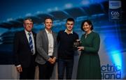 28 September 2019; Pictured is the Electric Ireland Minor Football All Star winner Aaron Browne of Kildare at the 2019 Electric Ireland Minor Star Awards alongside, from left, Munster Council chairman Liam Lenihan, Tomás Quinn and Executive Director of ESB Marguerite Sayers. The Football Team of the Year was selected by an expert panel of GAA legends including Alan Kerins, Derek McGrath, Karl Lacey and Tomás Quinn. The Electric Ireland GAA Minor Star Awards create a major moment for Minor players, showcasing the outstanding achievements of individual performers throughout the Championship season. The awards also recognise the effort of those who support them day in and day out, from their coaches to parents, clubs and communities. #GAAThisIsMajor Photo by David Fitzgerald/Sportsfile