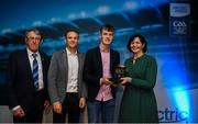 28 September 2019; Pictured is the Electric Ireland Minor Football All Star winner Michael O'Neill of Cork at the 2019 Electric Ireland Minor Star Awards alongside, from left, Munster Council chairman Liam Lenihan, Tomás Quinn and Executive Director of ESB Marguerite Sayers. The Football Team of the Year was selected by an expert panel of GAA legends including Alan Kerins, Derek McGrath, Karl Lacey and Tomás Quinn. The Electric Ireland GAA Minor Star Awards create a major moment for Minor players, showcasing the outstanding achievements of individual performers throughout the Championship season. The awards also recognise the effort of those who support them day in and day out, from their coaches to parents, clubs and communities. #GAAThisIsMajor Photo by David Fitzgerald/Sportsfile