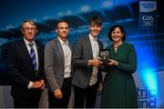 28 September 2019; Pictured is the Electric Ireland Minor Football All Star winner Darragh Cashman of Cork at the 2019 Electric Ireland Minor Star Awards alongside, from left, Munster Council chairman Liam Lenihan, Tomás Quinn and Executive Director of ESB Marguerite Sayers. The Football Team of the Year was selected by an expert panel of GAA legends including Alan Kerins, Derek McGrath, Karl Lacey and Tomás Quinn. The Electric Ireland GAA Minor Star Awards create a major moment for Minor players, showcasing the outstanding achievements of individual performers throughout the Championship season. The awards also recognise the effort of those who support them day in and day out, from their coaches to parents, clubs and communities. #GAAThisIsMajor Photo by David Fitzgerald/Sportsfile