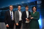 28 September 2019; Pictured is the Electric Ireland Minor Football All Star winner Devon Burns of Kerry at the 2019 Electric Ireland Minor Star Awards alongside, from left, Munster Council chairman Liam Lenihan, Tomás Quinn and Executive Director of ESB Marguerite Sayers. The Football Team of the Year was selected by an expert panel of GAA legends including Alan Kerins, Derek McGrath, Karl Lacey and Tomás Quinn. The Electric Ireland GAA Minor Star Awards create a major moment for Minor players, showcasing the outstanding achievements of individual performers throughout the Championship season. The awards also recognise the effort of those who support them day in and day out, from their coaches to parents, clubs and communities. #GAAThisIsMajor Photo by David Fitzgerald/Sportsfile