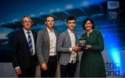 28 September 2019; Pictured is the Electric Ireland Minor Football All Star winner James Donaghy of Tyrone at the 2019 Electric Ireland Minor Star Awards alongside, from left, Munster Council chairman Liam Lenihan, Tomás Quinn and Executive Director of ESB Marguerite Sayers. The Football Team of the Year was selected by an expert panel of GAA legends including Alan Kerins, Derek McGrath, Karl Lacey and Tomás Quinn. The Electric Ireland GAA Minor Star Awards create a major moment for Minor players, showcasing the outstanding achievements of individual performers throughout the Championship season. The awards also recognise the effort of those who support them day in and day out, from their coaches to parents, clubs and communities. #GAAThisIsMajor Photo by David Fitzgerald/Sportsfile