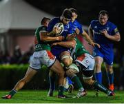 28 September 2019; Caelan Doris of Leinster is tackled by Alberto Sgarbi, left, and Luca Sperandio of Benetton during the Guinness PRO14 Round 1 match between Benetton and Leinster at Stadio Monigo in Treviso, Italy. Photo by Ramsey Cardy/Sportsfile