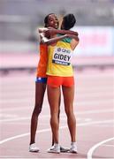 28 September 2019; Sifan Hassan of Netherlands, left, celebrates winning the Women's 10,000m final, with Letesenbet Gidey of Ethiopia who finished second, during day two of the World Athletics Championships 2019 at Khalifa International Stadium in Doha, Qatar. Photo by Sam Barnes/Sportsfile
