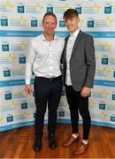 28 September 2019; Darragh Cashman of Millstreet and Cork, with coach Mick Hannon on their arrival at the 2019 Electric Ireland Minor Star Awards. The Hurling and Football Team of the Year was selected by an expert panel of GAA legends including Alan Kerins, Derek McGrath, Karl Lacey and Tomás Quinn. The Electric Ireland GAA Minor Star Awards create a major moment for Minor players, showcasing the outstanding achievements of individual performers throughout the Championship season. The awards also recognise the effort of those who support them day in and day out, from their coaches to parents, clubs and communities. #GAAThisIsMajor  Photo by Seb Daly/Sportsfile