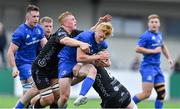 28 September 2019; Tommy O'Brien of Leinster is tackled by Ben Fry, left, and Garin Price of Dragons during The Celtic Cup Round 6 match between Leinster and Dragons at Energia Park in Donnybrook, Dublin. Photo by Piaras Ó Mídheach/Sportsfile