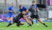 28 September 2019; Charlie Ryan of Leinster is tackled by James Sheekey, left, and Josh Reynolds of Dragons during The Celtic Cup Round 6 match between Leinster and Dragons at Energia Park in Donnybrook, Dublin. Photo by Piaras Ó Mídheach/Sportsfile