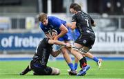28 September 2019; Charlie Ryan of Leinster is tackled by James Sheekey, left, and Ben Roach of Dragons during The Celtic Cup Round 6 match between Leinster and Dragons at Energia Park in Donnybrook, Dublin. Photo by Piaras Ó Mídheach/Sportsfile