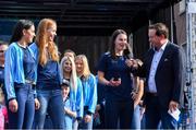 29 September 2019; MC Marty Morrissey with Dublin players, from right, Sinéad Aherne, Ciara Trant and Sinéad Goldrick during the Dublin Senior Football teams homecoming at Merrion Square in Dublin. Photo by Piaras Ó Mídheach/Sportsfile