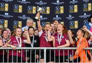 29 September 2019; Galway WFC captain Kayla Brady lifts the trophy following her side's victory during the Só Hotels U17 Women’s National League Cup Final match between Galway WFC and Peamount United at Eamonn Deacy Park in Galway. Photo by Seb Daly/Sportsfile