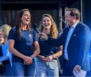 29 September 2019; MC Marty Morrissey interviews Dublin footballer Niamh McEvoy, left, as Noëlle Healy looks on, during the Dublin Senior Football teams homecoming at Merrion Square in Dublin. Photo by Piaras Ó Mídheach/Sportsfile