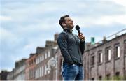 29 September 2019; Kevin McManamon singing during the Dublin Senior Football teams homecoming at Merrion Square in Dublin. Photo by David Fitzgerald/Sportsfile