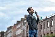 29 September 2019; Kevin McManamon singing during the Dublin Senior Football teams homecoming at Merrion Square in Dublin. Photo by David Fitzgerald/Sportsfile