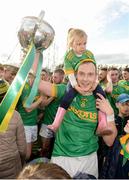 29 September 2019; Dunloy Captain Paul Shields and his daughter Ava Shields celebrate with the cup after the Antrim County Senior Club Hurling Final match between Cushendall Ruairí Óg and Dunloy at Ballycastle in Antrim. Photo by Oliver McVeigh/Sportsfile