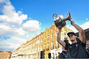 29 September 2019; Brian Fenton celebrates with the Sam Maguire cup during the Dublin Senior Football teams homecoming with the Sam Maguire Cup at Merrion Square in Dublin. Photo by David Fitzgerald/Sportsfile