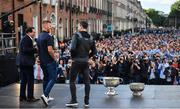 29 September 2019; Dublin players Stephen Cluxton, right, and Jonny Cooper on stage with MC Marty Morrissey during the Dublin Senior Football teams homecoming with the Sam Maguire Cup at Merrion Square in Dublin. Photo by David Fitzgerald/Sportsfile