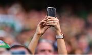 27 July 2019; A spectator takes a photograph during the GAA Hurling All-Ireland Senior Championship Semi-Final match between Kilkenny and Limerick at Croke Park in Dublin. Photo by Piaras Ó Mídheach/Sportsfile