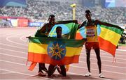 30 September 2019; Muktar Edris of Ethiopia, centre, celebrates after winning the men's 5000m final with team-mates Selemon Barega, right, who finished second, and Telahun Haile Bekele during day four of the World Athletics Championships 2019 at the Khalifa International Stadium in Doha, Qatar. Photo by Sam Barnes/Sportsfile