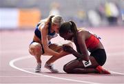 30 September 2019; Beatrice Chepkoech of Kenya is congratulated by Emma Coburn of USA after winning the Women's 3000m Steeple Chase during day four of the World Athletics Championships 2019 at the Khalifa International Stadium in Doha, Qatar. Photo by Sam Barnes/Sportsfile