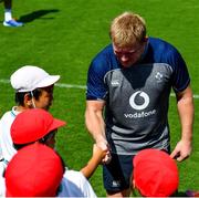 1 October 2019; John Ryan meets local children during Ireland Rugby squad training at the Kobelco Steelers in Kobe, Japan. Photo by Brendan Moran/Sportsfile
