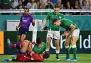 3 October 2019; Garry Ringrose, right, and Andrew Conway of Ireland celebrate after team-mate Rob Kearney scored their side's first try during the 2019 Rugby World Cup Pool A match between Ireland and Russia at the Kobe Misaki Stadium in Kobe, Japan. Photo by Brendan Moran/Sportsfile