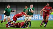3 October 2019; Peter O'Mahony of Ireland is tackled by Evgeny Elgin and Andrey Ostrikov of Russia during the 2019 Rugby World Cup Pool A match between Ireland and Russia at the Kobe Misaki Stadium in Kobe, Japan. Photo by Brendan Moran/Sportsfile