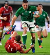 3 October 2019; CJ Stander of Ireland beats the tackle of Denis Simplikevich of Russia during the 2019 Rugby World Cup Pool A match between Ireland and Russia at the Kobe Misaki Stadium in Kobe, Japan. Photo by Brendan Moran/Sportsfile