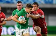 3 October 2019; Garry Ringrose of Ireland is tackled by Kirill Gotovtsev of Russia during the 2019 Rugby World Cup Pool A match between Ireland and Russia at the Kobe Misaki Stadium in Kobe, Japan. Photo by Brendan Moran/Sportsfile