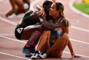 3 October 2019; Katarina Johnson-Thompson of Great Britain, right, celebrates with Odile Ahouanwanou of Benin after winning the Womens Heptathlon during day seven of the 17th IAAF World Athletics Championships Doha 2019 at the Khalifa International Stadium in Doha, Qatar. Photo by Sam Barnes/Sportsfile