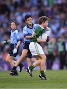 14 September 2019; Muiris O’Donoghue of Dr Crokes, Co Kerry, is tackled by Josh Higgins of St Patrick’s Gaa, Donabate, Co Dublin, during the INTO Cumann na mBunscol GAA Respect Exhibition Go Games at Dublin v Kerry - GAA Football All-Ireland Senior Championship Final Replay at Croke Park in Dublin. Photo by Ray McManus/Sportsfile