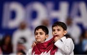 4 October 2019; Young Qatar supporters watch on as Mutaz Essa Barshim of Qatar competes in the Men's High Jump Final during day eight of the 17th IAAF World Athletics Championships Doha 2019 at the Khalifa International Stadium in Doha, Qatar. Photo by Sam Barnes/Sportsfile