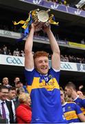 18 August 2019; Tipperary's Robert Byrne lifts the Liam MacCarthy Cup after the GAA Hurling All-Ireland Senior Championship Final match between Kilkenny and Tipperary at Croke Park in Dublin. Photo by Ray McManus/Sportsfile