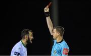 4 October 2019; Kevin Knight of Cabinteely is shown the red card by referee Alan Carey during the SSE Airtricity League First Division Promotion / Relegation Play-Off Series First Leg match between Cabinteely and Longford Town at Stradbrook Road in Blackrock, Dublin. Photo by Piaras Ó Mídheach/Sportsfile