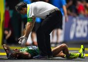 4 October 2019; Alex Wright of Ireland is helped to his feet after competing in Men's 20km Race Walk during day eight of the 17th IAAF World Athletics Championships Doha 2019 at the Corniche in Doha, Qatar. Photo by Sam Barnes/Sportsfile