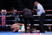 5 October 2019; Medical staff come to the aid of Joe Ward after he goes down with a knee injury during his Light Heavy bout with Marc Delgado at Madison Square Garden in New York, USA. Photo by Ed Mulholland/Matchroom Boxing USA via Sportsfile