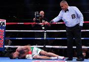 5 October 2019; Joe Ward goes down with a knee injury during his Light Heavy bout with Marc Delgado at Madison Square Garden in New York, USA. Photo by Ed Mulholland/Matchroom Boxing USA via Sportsfile