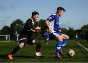 6 October 2019; Karl Melling of Leinster Senior League in action against Laurence Toland of Ulster Senior League during the FAI Michael Ward Inter League Tournament match between Leinster Senior League and Ulster Senior League at Hartstown Huntstown Football Club in Dublin. Photo by Harry Murphy/Sportsfile