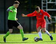 6 October 2019; Jake Hegarty of Munster Senior League in action against Des Hope of Connacht FA during the FAI Michael Ward Inter League Tournament match between Munster Senior League and Connacht FA at Kilbarrack United in Dublin. Photo by Seb Daly/Sportsfile