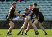 6 October 2019; Charles McGuinness of Naomh Conaill in action against Eamon Doherty, Aaron Deeney and Conor Morrison of St Eunan's during the Donegal County Senior Club Football Championship semi-final match between St Eunan's and Naomh Conaill at MacCumhaill Park in Ballybofey, Donegal. Photo by Oliver McVeigh/Sportsfile