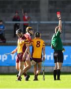 6 October 2019; Referee Sean Stack issues a red card to Eugene Farrell of Craobh Chiaráin during the Dublin County Senior Club Hurling Championship semi-final match between Craobh Chiaráin and St Brigid's at Parnell Park in Dublin. Photo by David Fitzgerald/Sportsfile