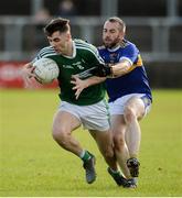 6 October 2019; Michael Carroll of Gaoth Dobhair in action against Brian McGinley of Kilcar during the Donegal County Senior Club Football Championship semi-final match between Kilcar and Gaoth Dobhair at MacCumhaill Park in Ballybofey, Donegal. Photo by Oliver McVeigh/Sportsfile