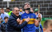 6 October 2019; Diarmuid Byrnes of Patrickswell celebrates with supporter Anthony Carmody after the Limerick County Senior Club Hurling Championship Final match between Na Piarsaigh and Patrickswell at LIT Gaelic Grounds in Limerick. Photo by Piaras Ó Mídheach/Sportsfile